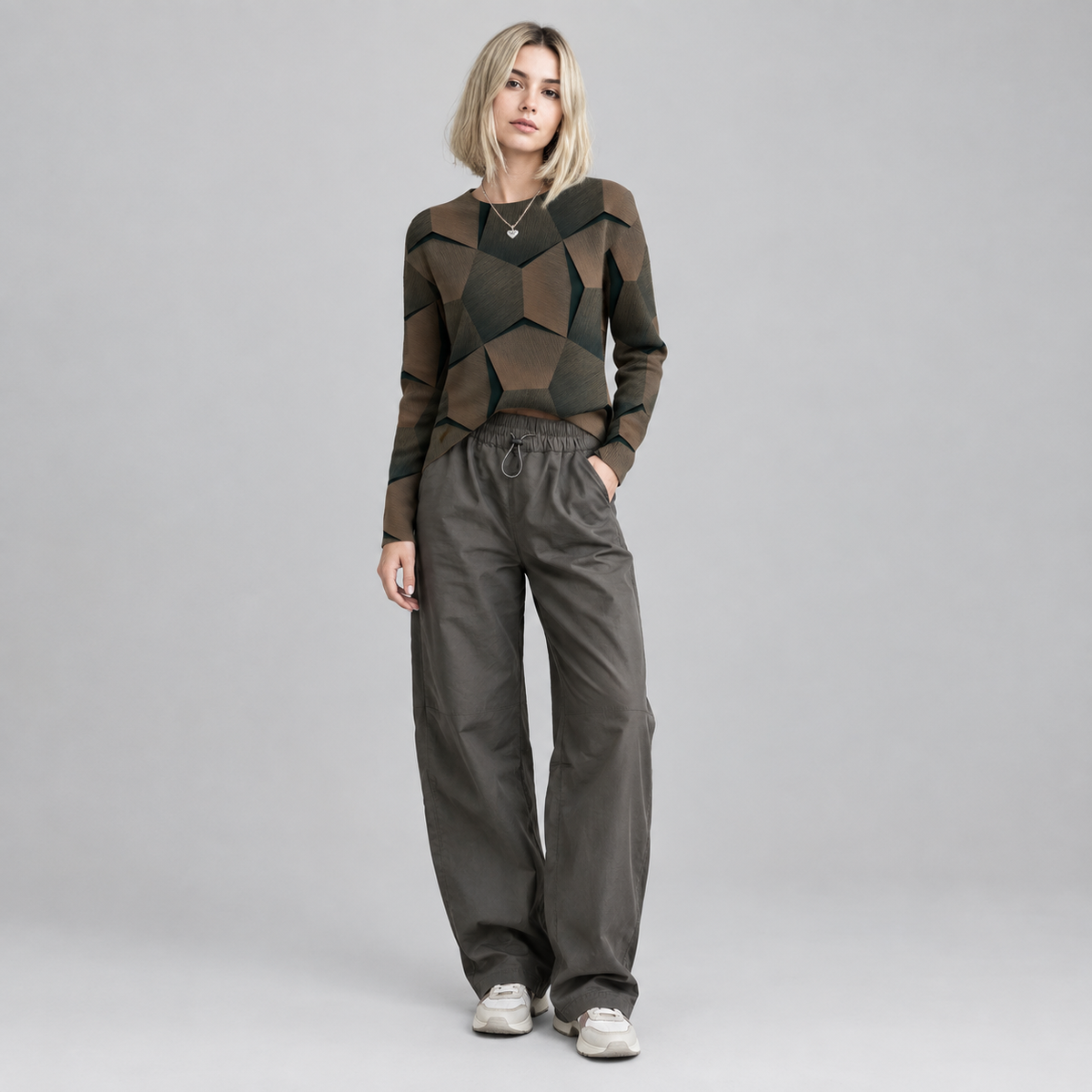 Women's Long Sleeve Geometric Print Knit Sweater on a model, colour option