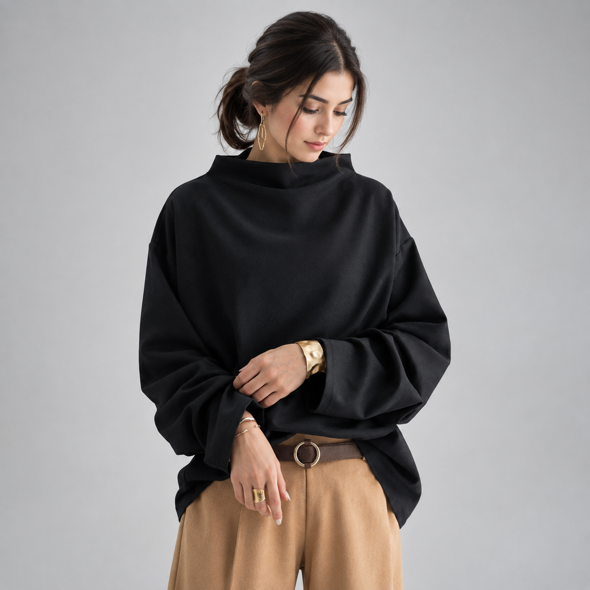 Women's Oversized Mock-Neck Knit Sweater Top on a model, front detail