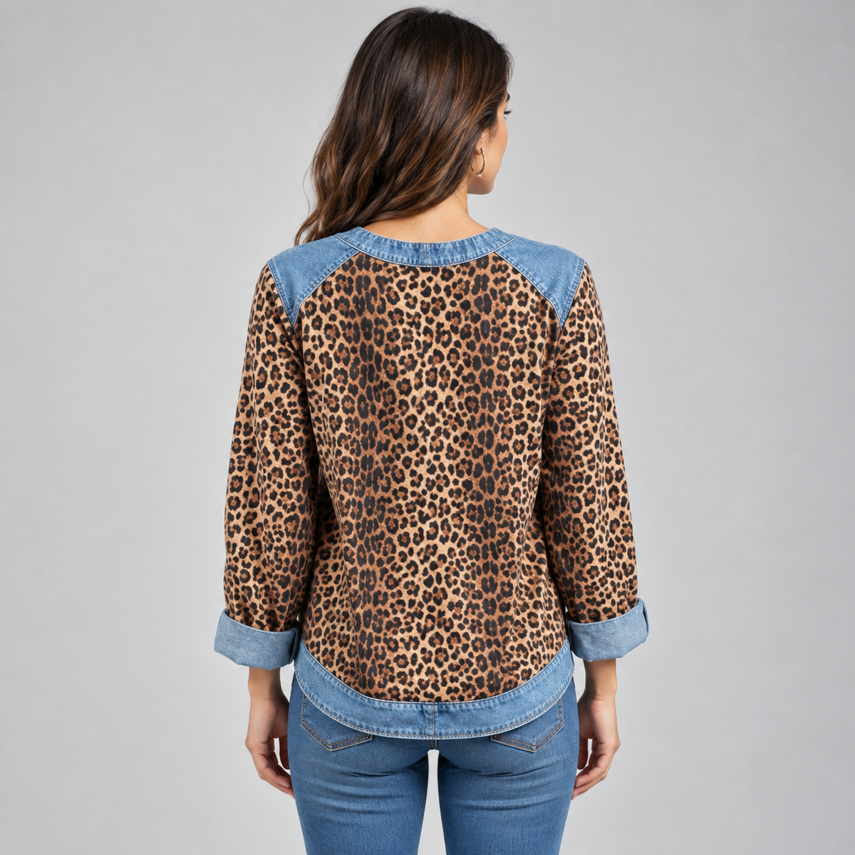 Women's Leopard Print Denim Patchwork Sweater on a model, back view
