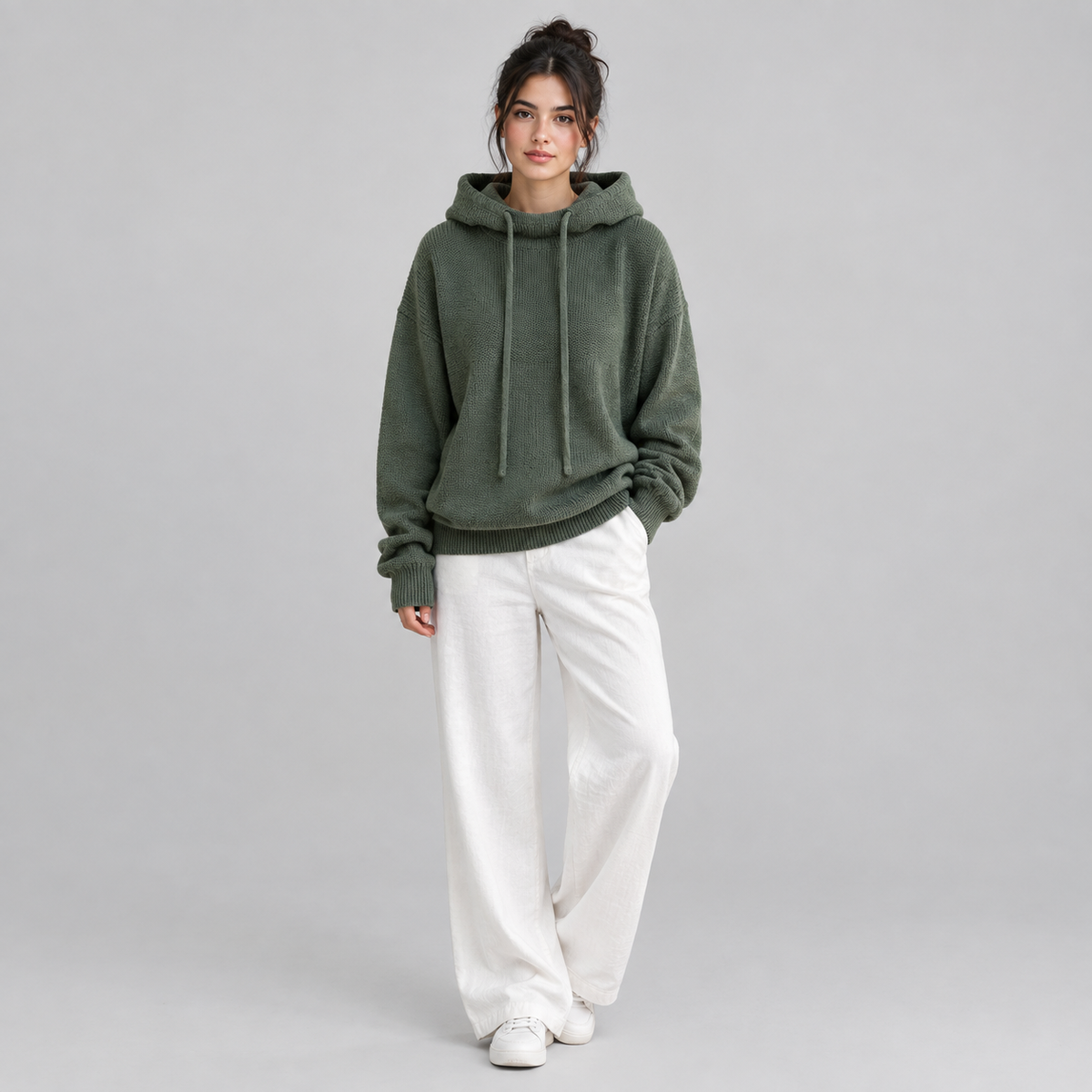 Women's Oversized Hooded High-Neck Knit Sweater on a model, front view