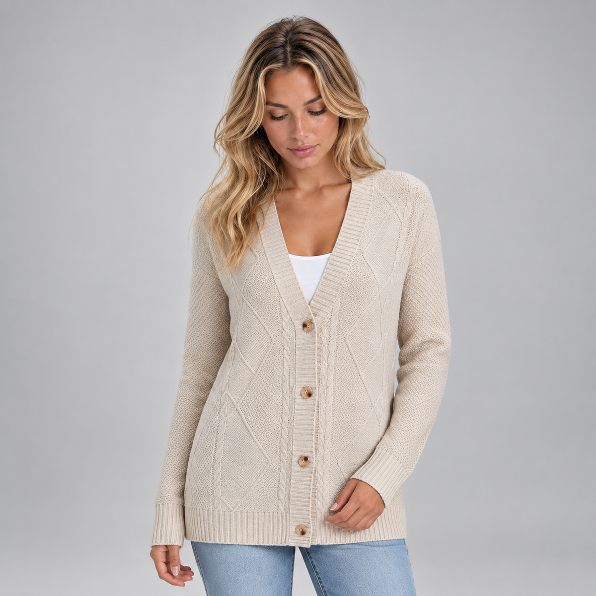 Women’s Cable Knit Button Cardigan on a model, front detail