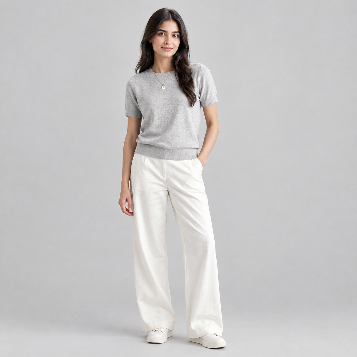 Women’s Relaxed Fit Short Sleeve Knit Sweater Top on a model, colour option