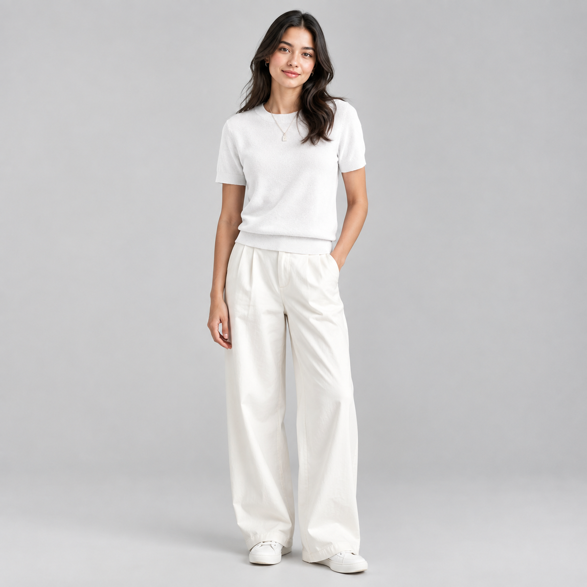 Women’s Relaxed Fit Short Sleeve Knit Sweater Top on a model, colour option