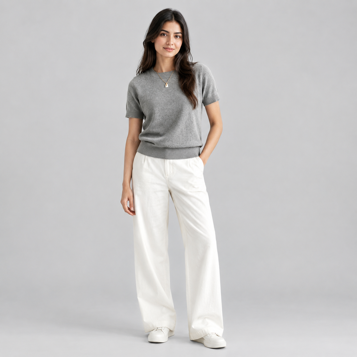 Women’s Relaxed Fit Short Sleeve Knit Sweater Top on a model, colour option