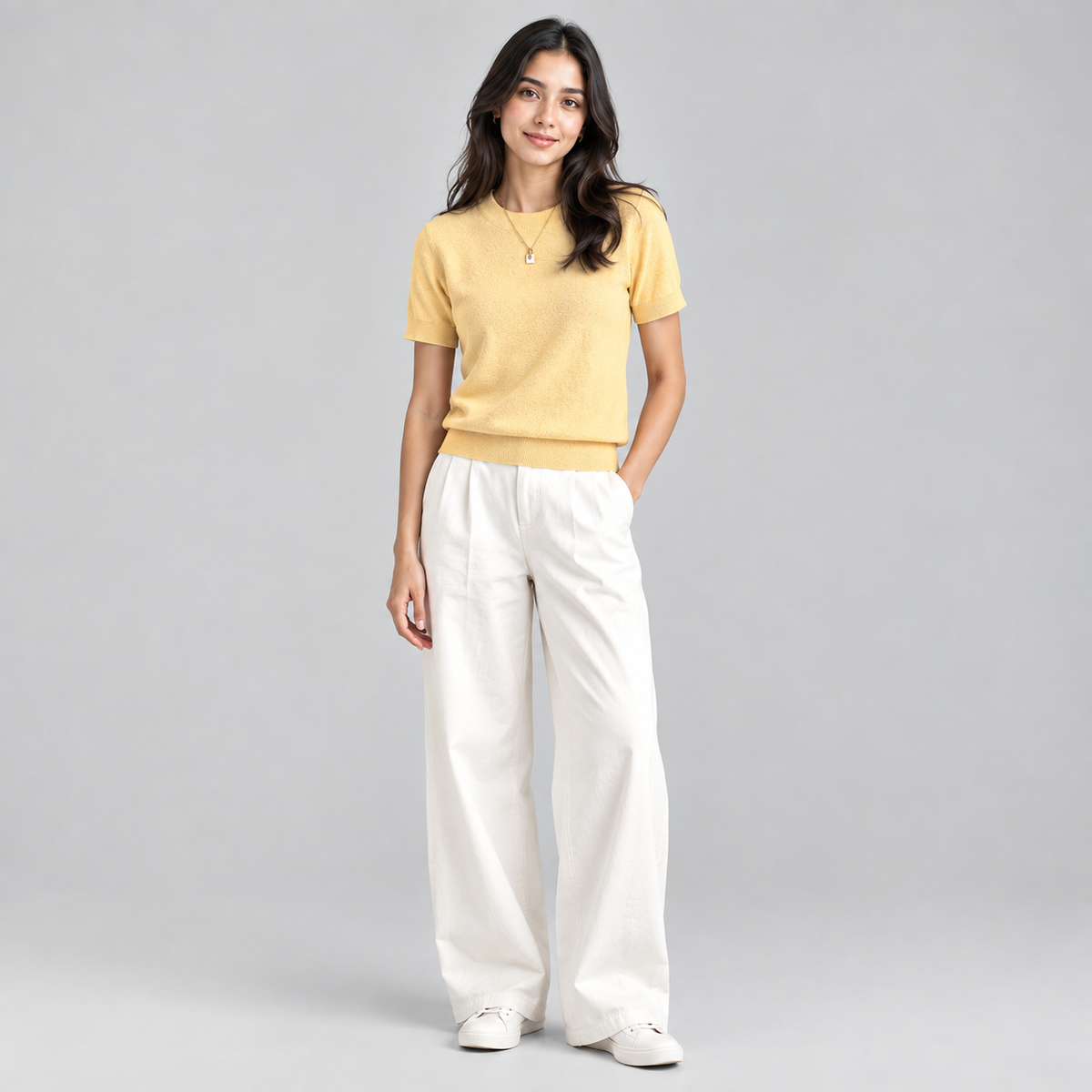 Women’s Relaxed Fit Short Sleeve Knit Sweater Top on a model, colour option
