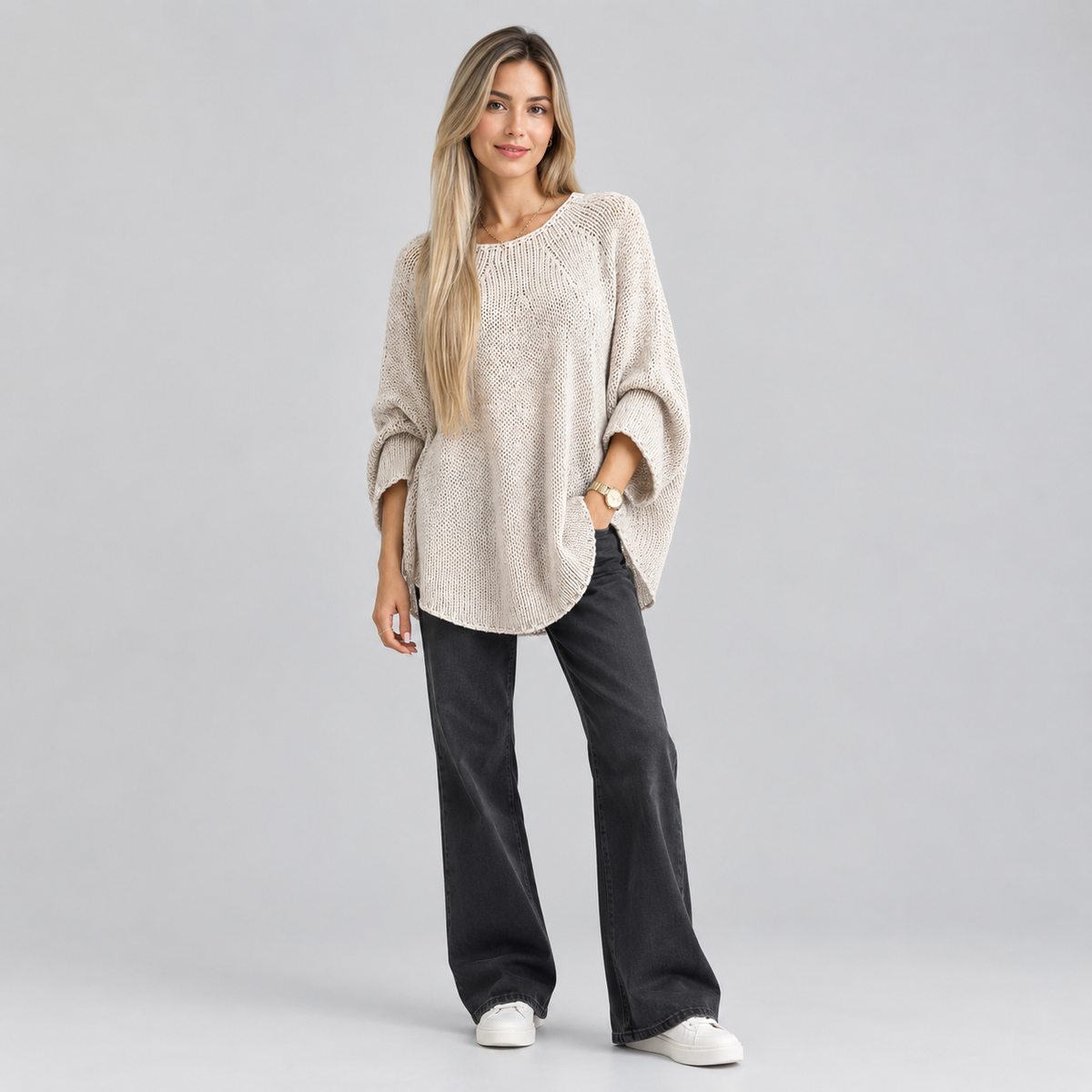 Women’s Oversized Batwing-Sleeve Knit Sweater on a model, front view
