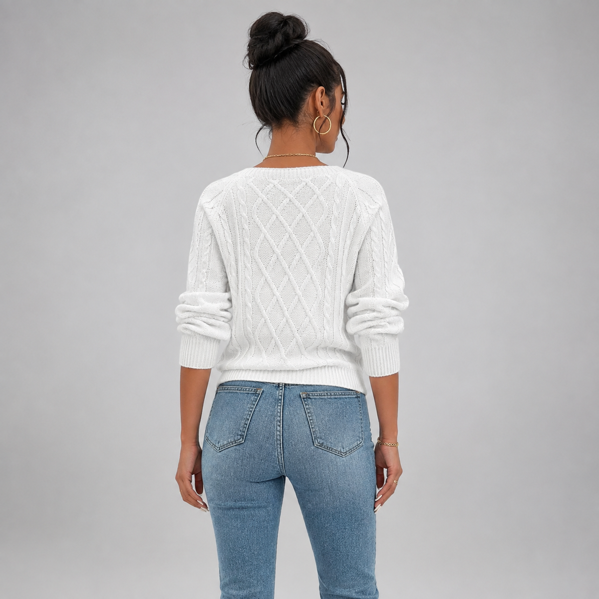 Women's Cable Knit Round Neck Sweater on a model, back view