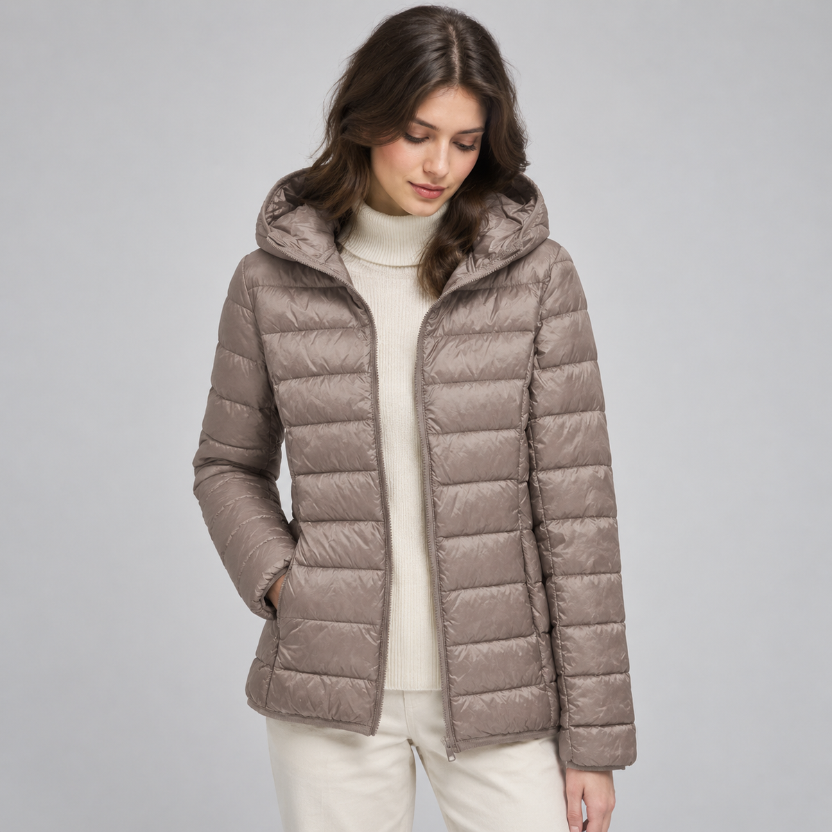 Women's Lightweight Hooded Quilted Jacket on a model, front detail