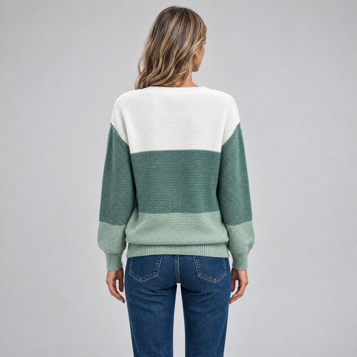 Women's Colour Block Relaxed Fit Knit Sweater on a model, back view