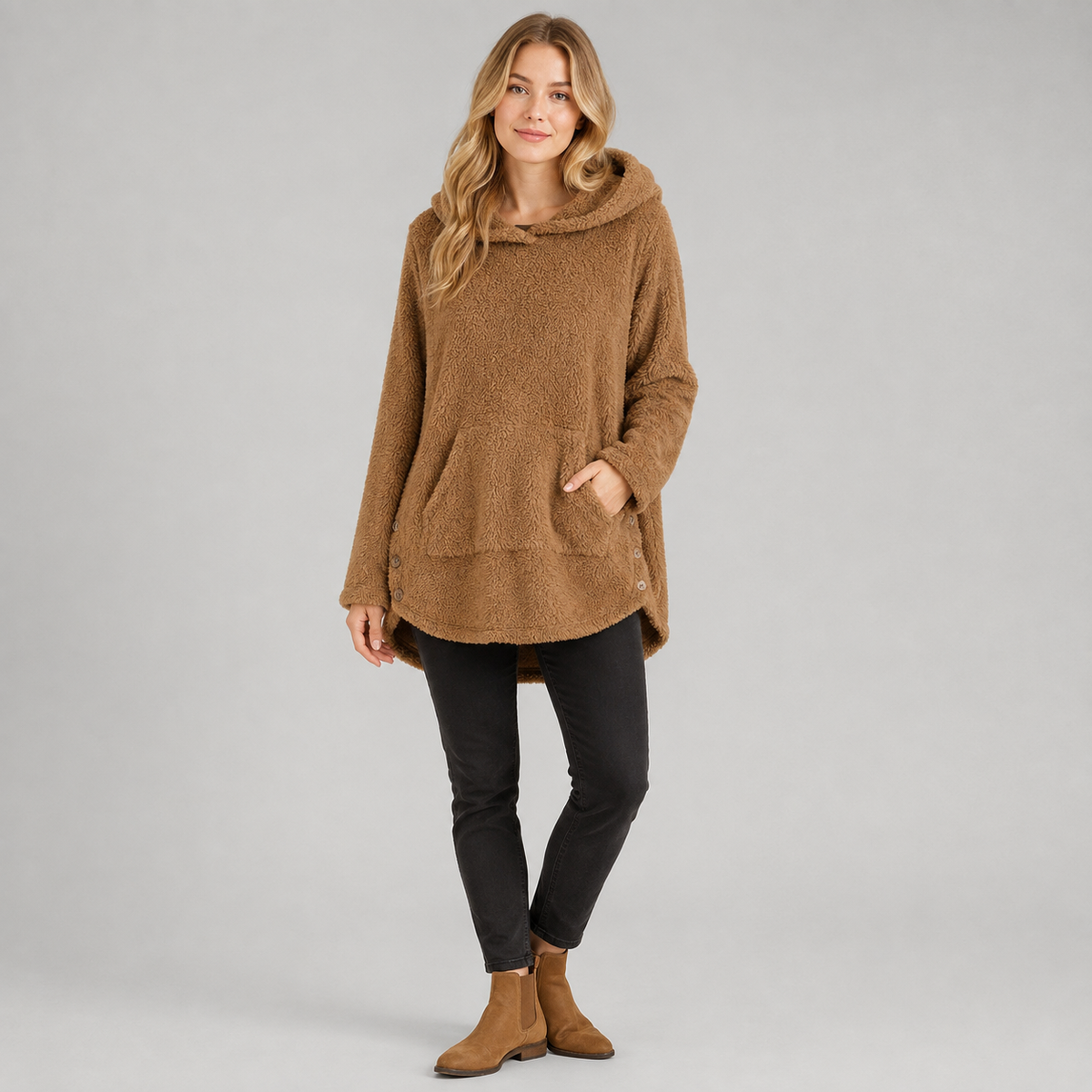 Women's hooded fleece pullover on a model, front view