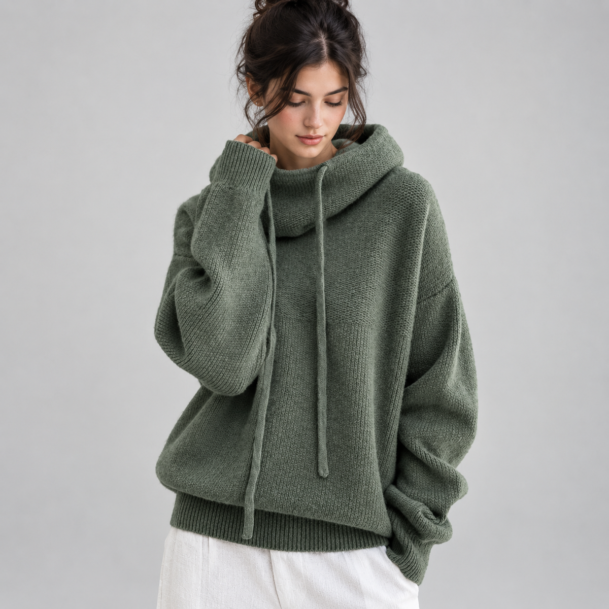 Women's Oversized Hooded High-Neck Knit Sweater on a model, front detail