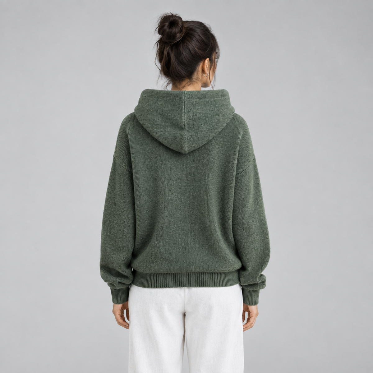 Women's Oversized Hooded High-Neck Knit Sweater on a model, back view