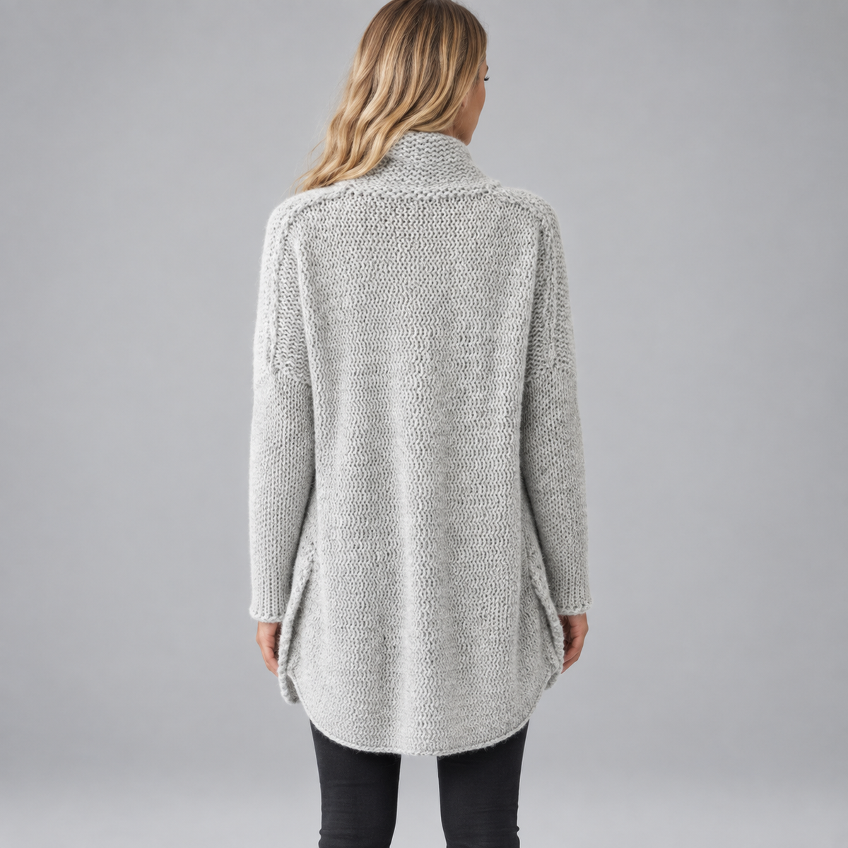 Women's Oversized Chunky Knit Turtleneck Sweater on a model, back view