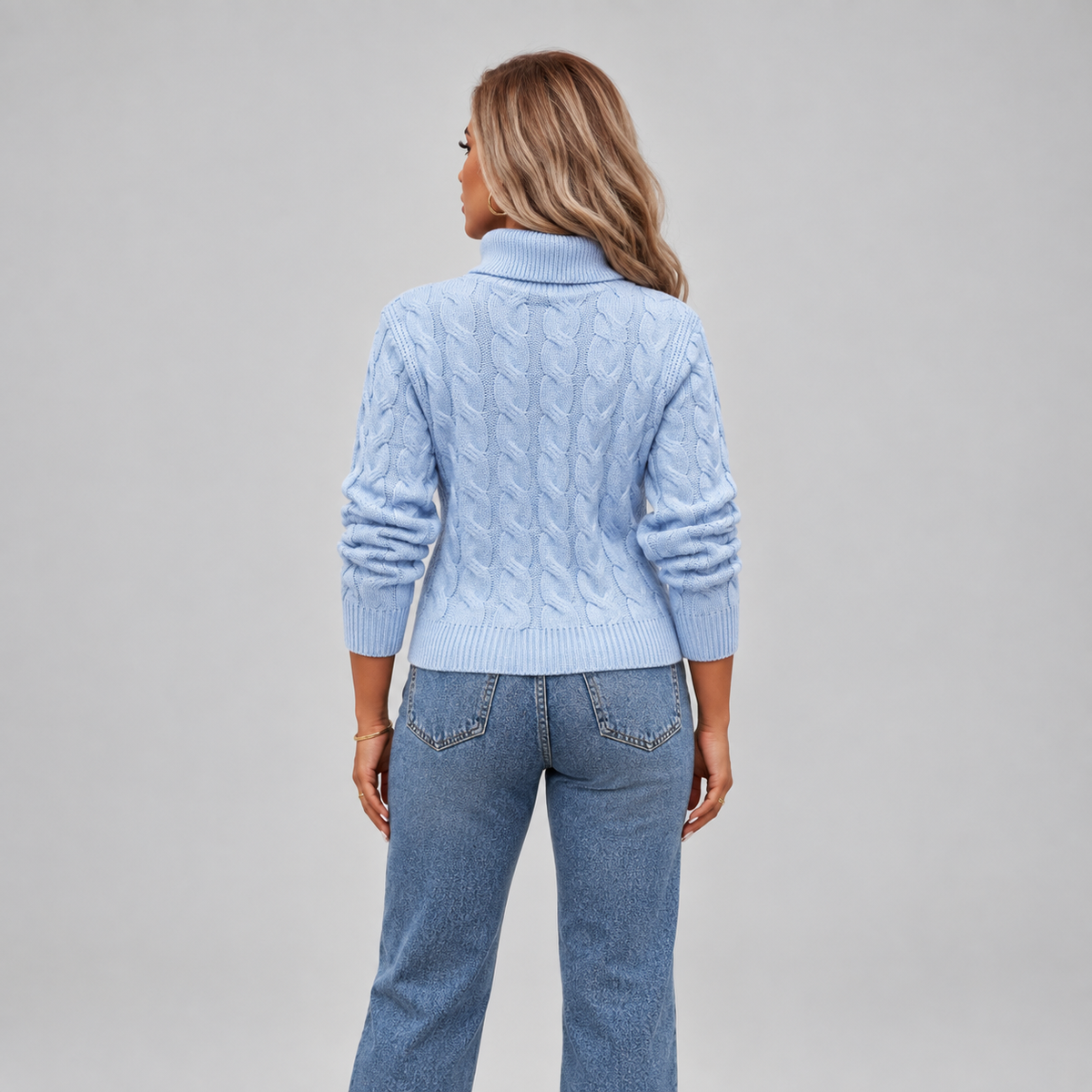 Women's Cable Knit Turtleneck Sweater on a model, back view