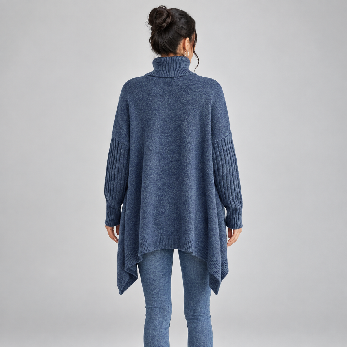 Women's Oversized Ribbed Turtleneck Sweater on a model, back view