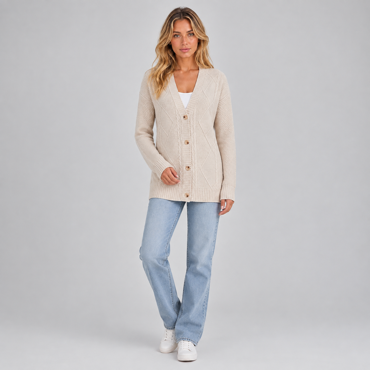 Women’s Cable Knit Button Cardigan on a model, front view