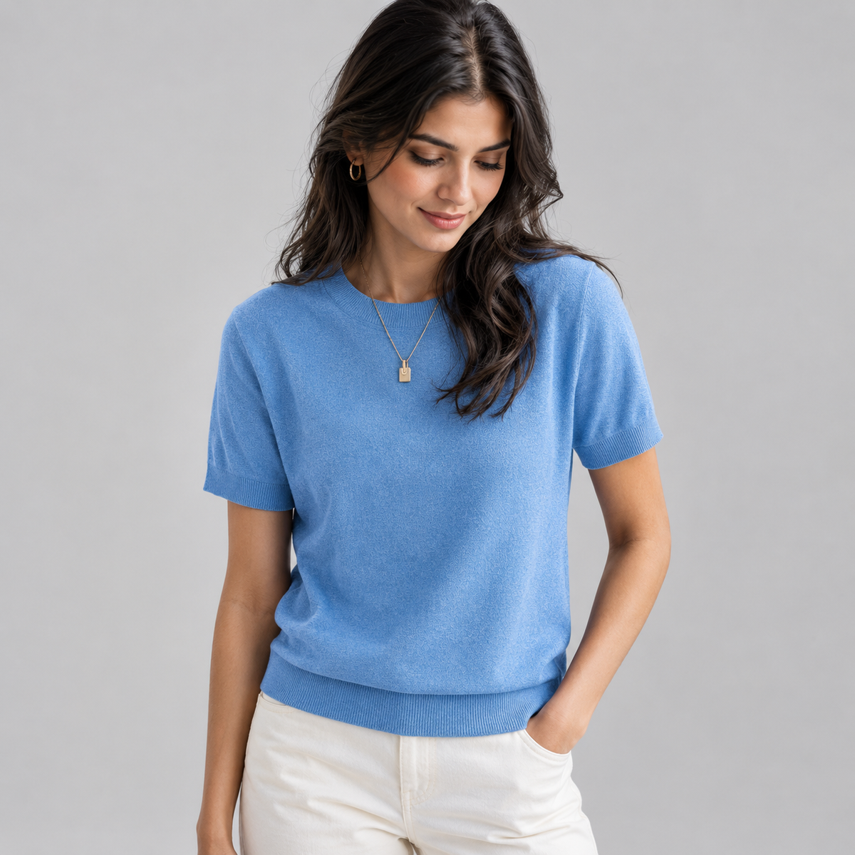 Women’s Relaxed Fit Short Sleeve Knit Sweater Top on a model, front detail