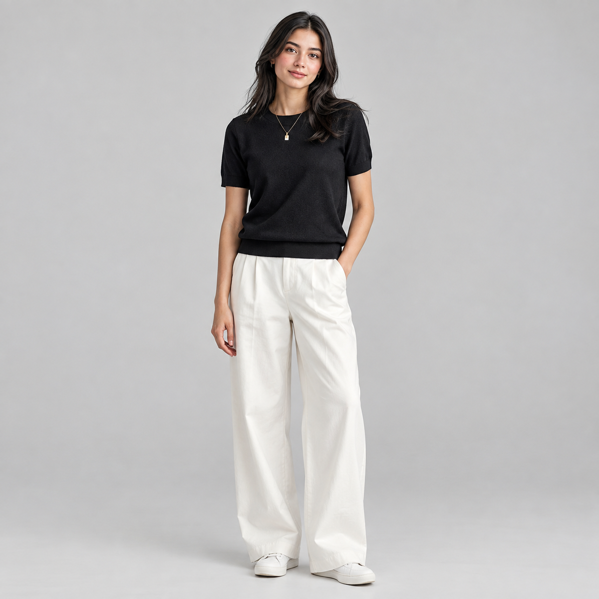 Women’s Relaxed Fit Short Sleeve Knit Sweater Top on a model, colour option