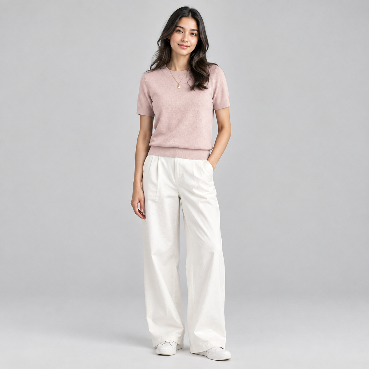 Women’s Relaxed Fit Short Sleeve Knit Sweater Top on a model, colour option