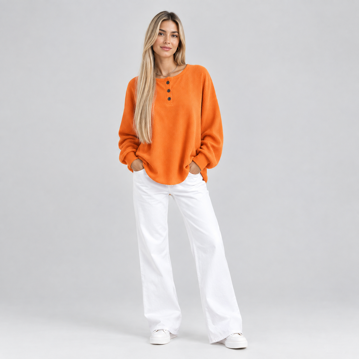 Women’s Relaxed-Fit Waffle Knit Henley Top on a model, front view