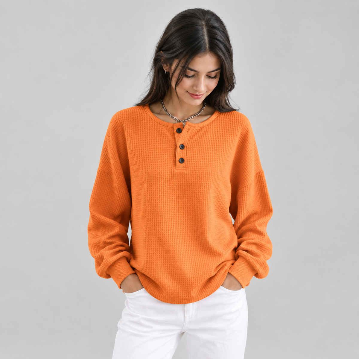 Women’s Relaxed-Fit Waffle Knit Henley Top on a model, front detail