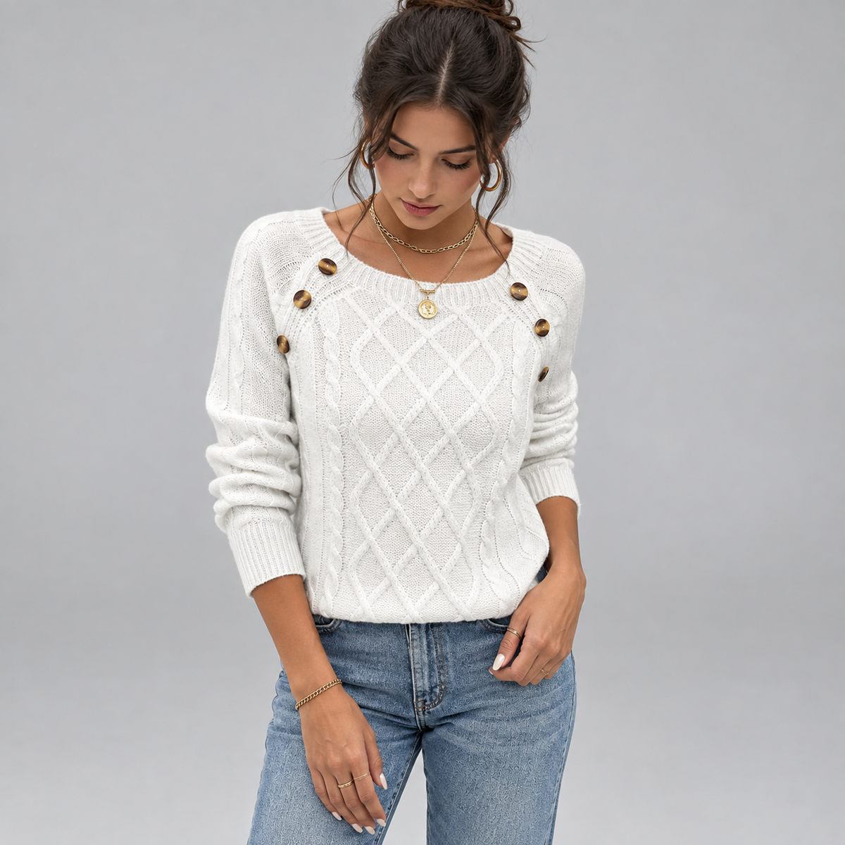 Women's Cable Knit Round Neck Sweater on a model, front detail