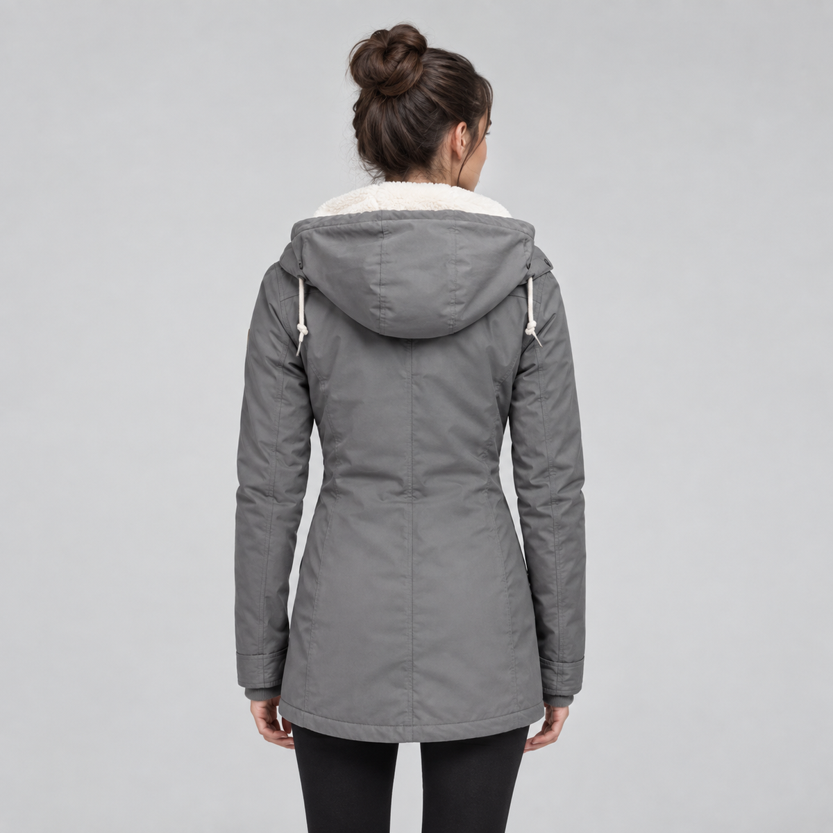 Women's Sherpa-Lined Hooded Quilted Jacket on a model, back view